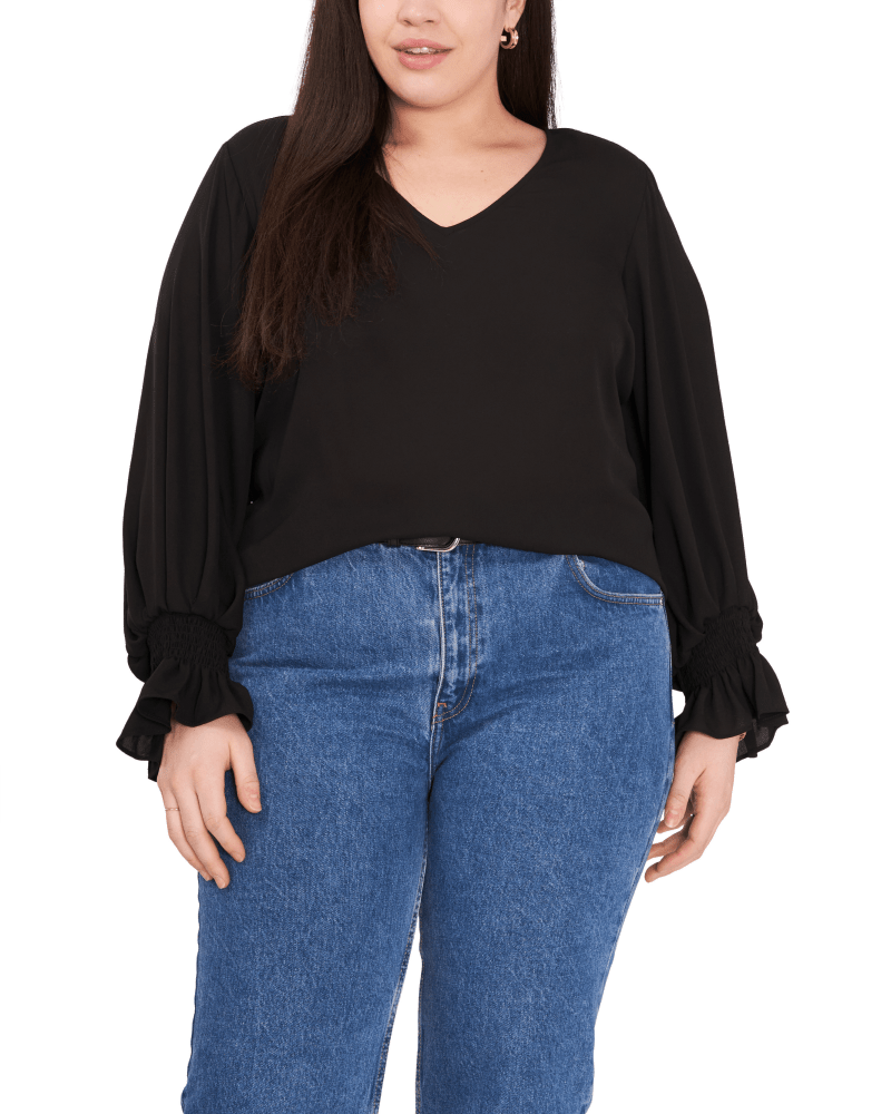 Front of a model wearing a size 1X Allie V-Neck Blouse in RICH BLACK by Vince Camuto. | dia_product_style_image_id:261485
